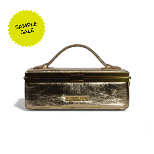 SAMPLE SALE Zuri top handle soft trunk mini bag with gold clasp in Gold