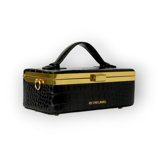 Zuri top handle mini bag with gold clasp in Matte Black Croc