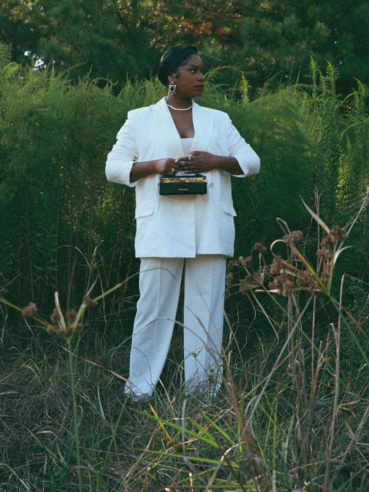 Zuri top handle mini bag with gold clasp in Matte Black Croc